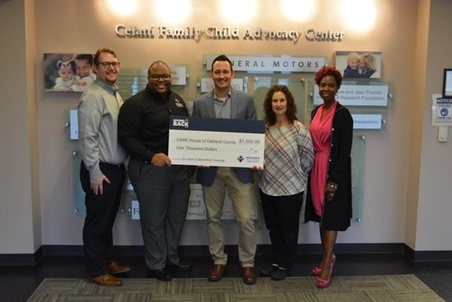 CARE House of Oakland County check presentation